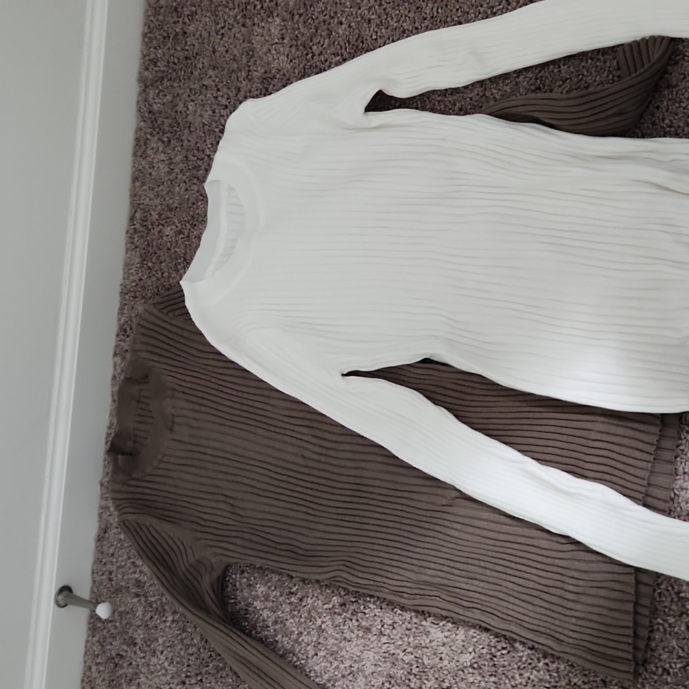 Ribbed knit sweater tops with thumbholes
